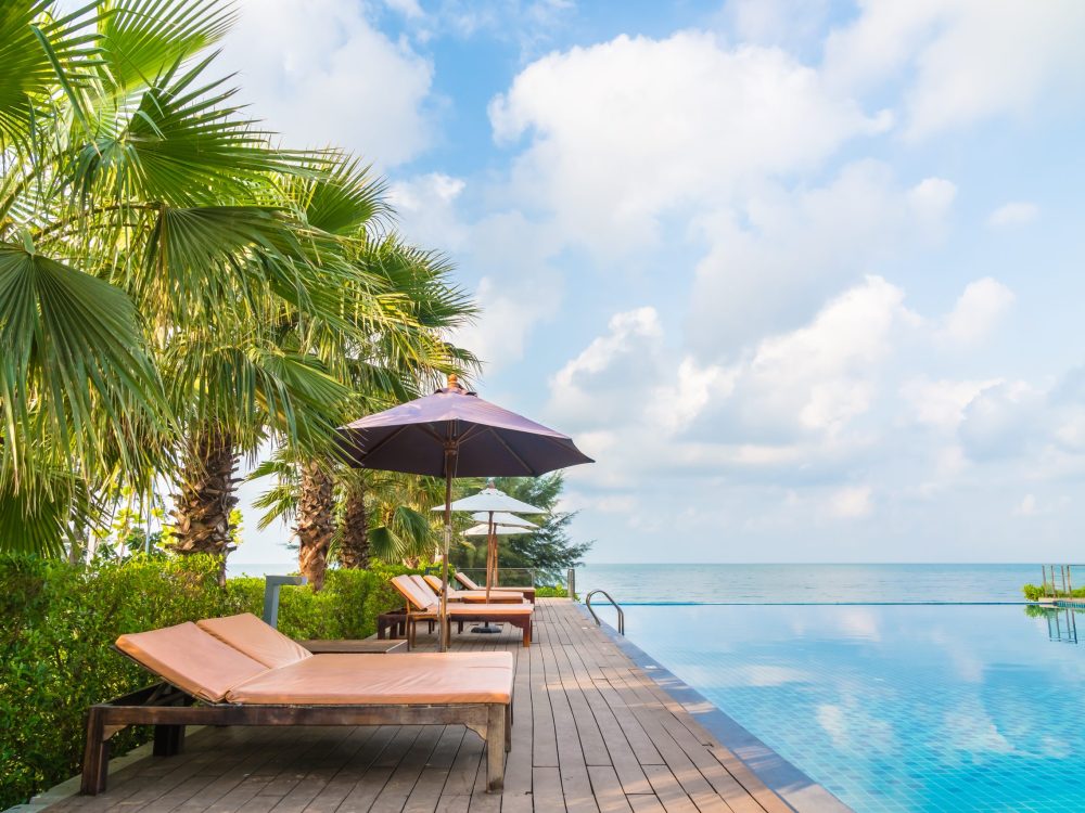 Outdoor swimming pool Beautiful luxury outdoor swimming pool around hotel and resort - Vacation concept